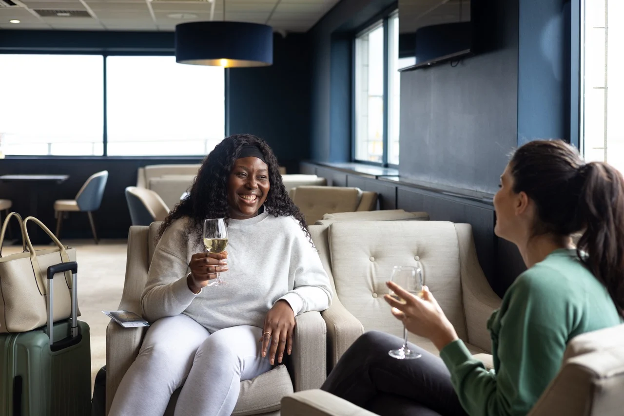 Non business people within airport lounge